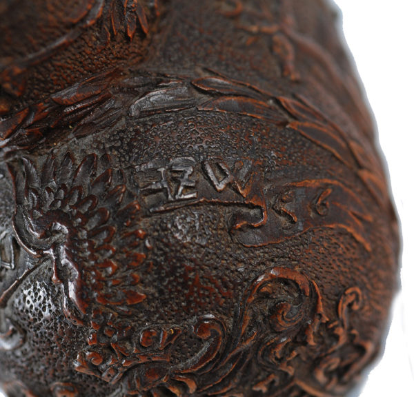 A boxwood powder flask - dated "1656"