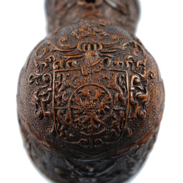 A boxwood powder flask - dated "1656"