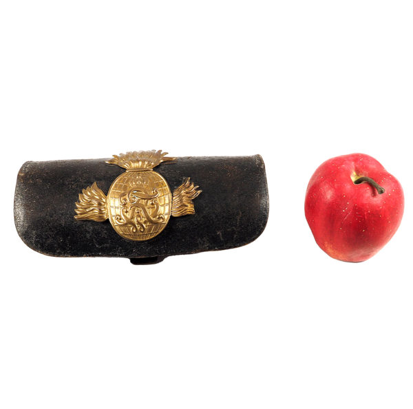 Prussia - Cartridge case for field artillery crews, model 1874 Black lacquered leather case with applied brass fittings. Three-piece flamed grenade with crowned monogram "FRW" (joined).
